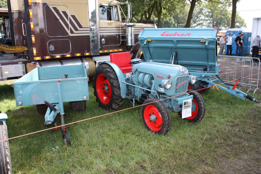 atinyeishertractorwithacoupleofeishertrailerstoo.jpg
